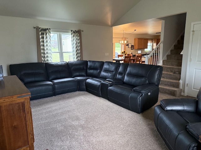 6 Kimberly Dr, Spring Valley, IL 61362 - carpeted living area with a chandelier, healthy amount of natural light, lofted ceiling, and stairway