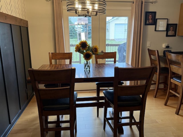 6 Kimberly Dr, Spring Valley, IL 61362 - dining room with light wood-type flooring and a chandelier