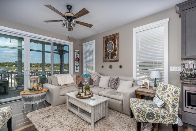 210 Leeward Way, Ottawa, IL 61350 - living room featuring ceiling fan, plenty of natural light, and wood finished floors