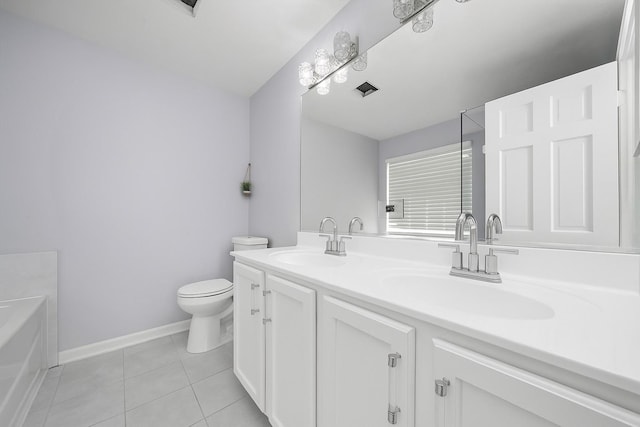 1024 Birchwood Dr, Pingree Grove, IL 60140 - bathroom featuring double vanity, tile patterned flooring, and a tub