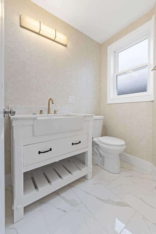 3002 Wesley Ave, Berwyn, IL 60402 - bathroom with vanity and marble finish flooring