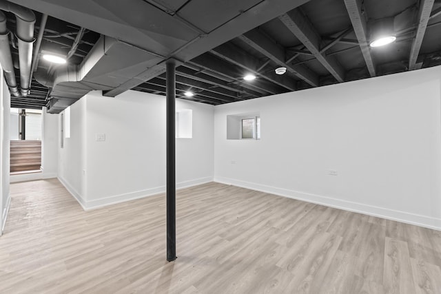 3002 Wesley Ave, Berwyn, IL 60402 - below grade area featuring wood finished floors and stairs