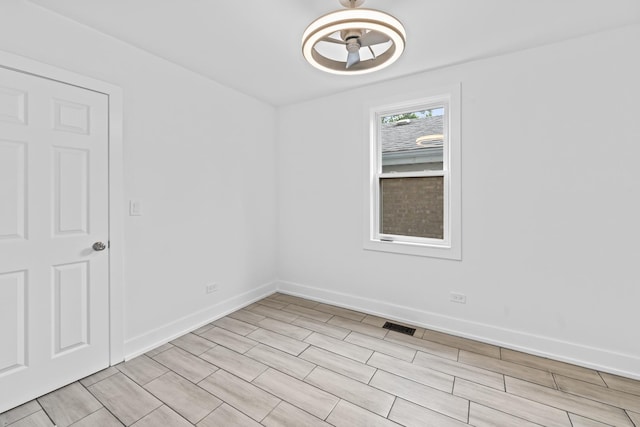 3002 Wesley Ave, Berwyn, IL 60402 - empty room featuring wood finish floors