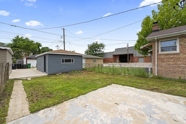 3002 Wesley Ave, Berwyn, IL 60402 - fenced yard featuring an outdoor structure and a patio area