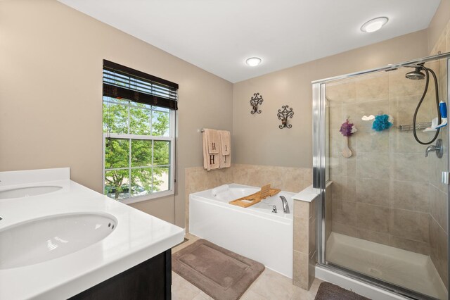 1680 Rockport Rd, Hampshire, IL 60140 - bathroom featuring a bath, tile patterned flooring, a stall shower, and double vanity