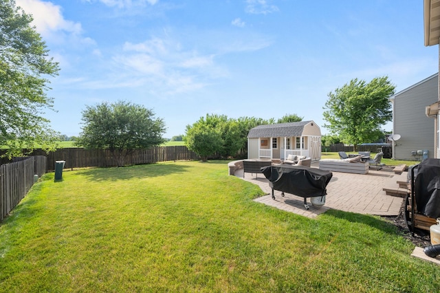 1680 Rockport Rd, Hampshire, IL 60140 - fenced backyard featuring an outbuilding, a patio, and outdoor lounge area