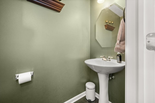 1680 Rockport Rd, Hampshire, IL 60140 - bathroom featuring baseboards and a sink