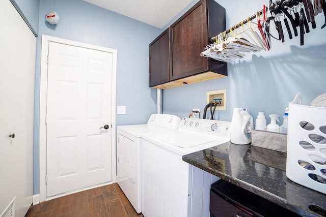 2001 Jeffrey Ln, Elgin, IL 60123 - laundry room featuring cabinet space, washing machine and clothes dryer, and dark wood-style flooring