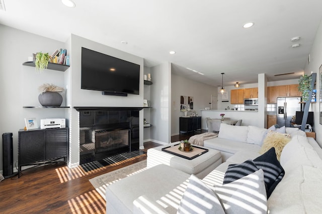 1255 N Orleans Ct Unit 1104, Chicago, IL 60610 - living room featuring dark wood-style flooring, recessed lighting, and a tiled fireplace