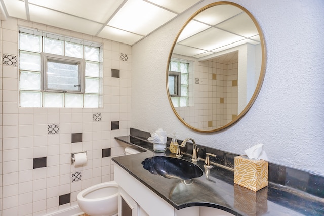 15407 Sunset Dr, Dolton, IL 60419 - bathroom featuring a textured wall and vanity