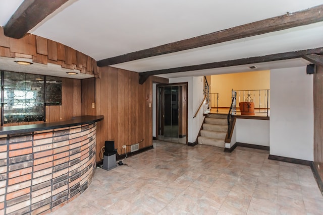 15407 Sunset Dr, Dolton, IL 60419 - indoor dry bar featuring beam ceiling, wood walls, and stairs