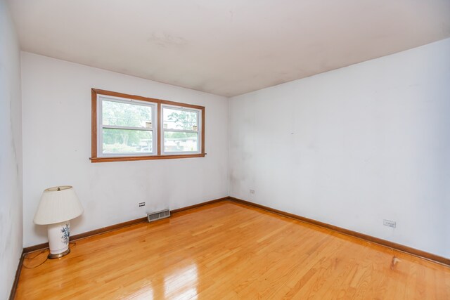 15407 Sunset Dr, Dolton, IL 60419 - spare room featuring light wood-style floors