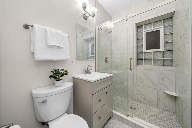 535 W Eugenie St Unit 1, Chicago, IL 60614 - bathroom featuring vanity, a stall shower, and tile patterned flooring