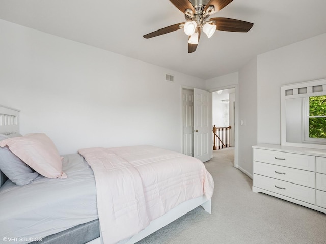 627 Williams Way, Vernon Hills, IL 60061 - bedroom with light colored carpet and a ceiling fan