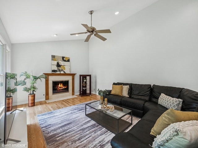 627 Williams Way, Vernon Hills, IL 60061 - living room featuring lofted ceiling, wood finished floors, a premium fireplace, a ceiling fan, and recessed lighting