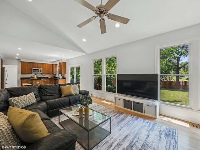 627 Williams Way, Vernon Hills, IL 60061 - living area with recessed lighting, light wood finished floors, vaulted ceiling, and a ceiling fan