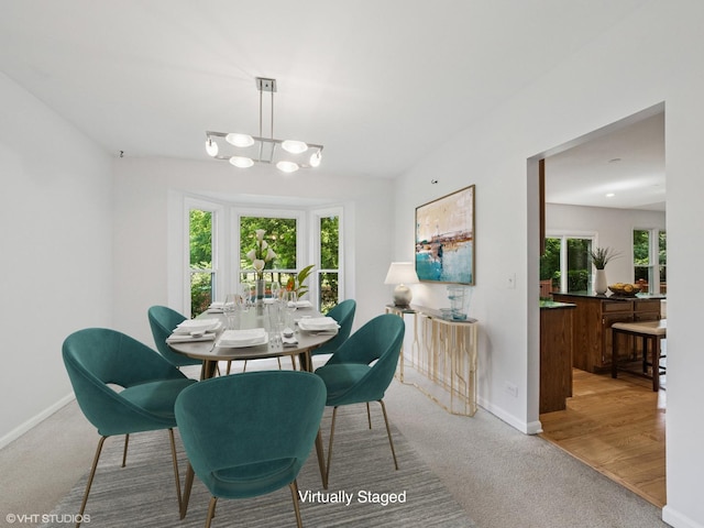 627 Williams Way, Vernon Hills, IL 60061 - dining room with light carpet and a chandelier