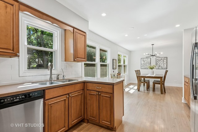 1575 Burning Trl, Wheaton, IL 60189 - kitchen featuring stainless steel dishwasher, brown cabinetry, tasteful backsplash, and recessed lighting