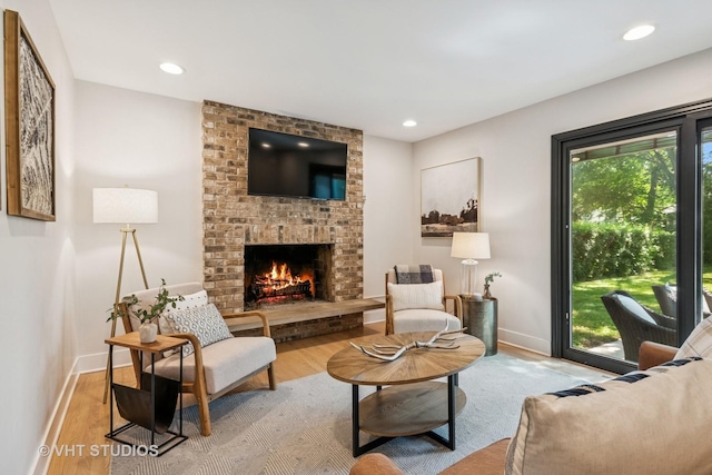 1575 Burning Trl, Wheaton, IL 60189 - living room with wood finished floors, a brick fireplace, and recessed lighting