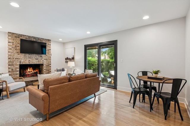 1575 Burning Trl, Wheaton, IL 60189 - living room with light wood-style floors, recessed lighting, and a brick fireplace