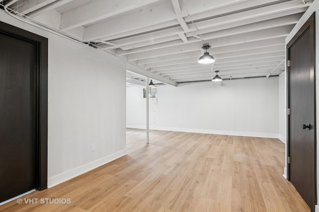 1575 Burning Trl, Wheaton, IL 60189 - finished below grade area featuring baseboards and light wood-style flooring
