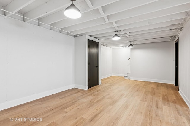 1575 Burning Trl, Wheaton, IL 60189 - finished basement featuring light wood-style flooring and baseboards