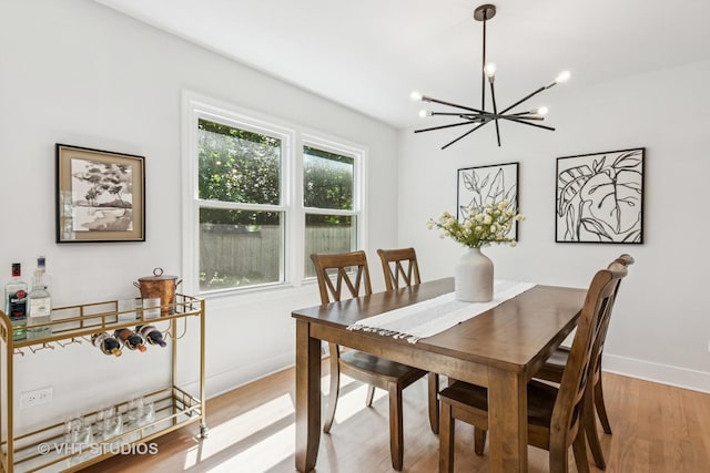 1575 Burning Trl, Wheaton, IL 60189 - dining room featuring a chandelier and light wood-style floors