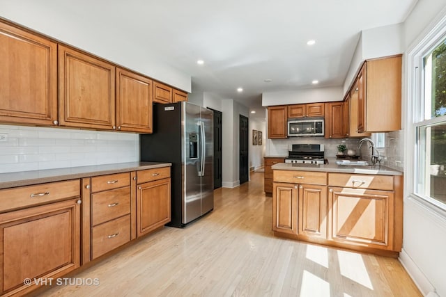 1575 Burning Trl, Wheaton, IL 60189 - kitchen with stainless steel appliances, light wood-type flooring, brown cabinetry, tasteful backsplash, and recessed lighting