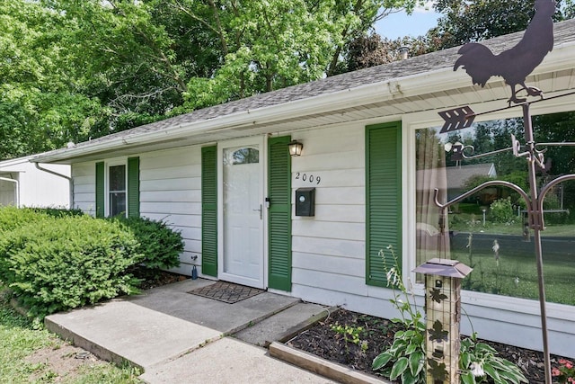 2009 E Michigan Ave, Urbana, IL 61802 - view of exterior entry featuring a shingled roof