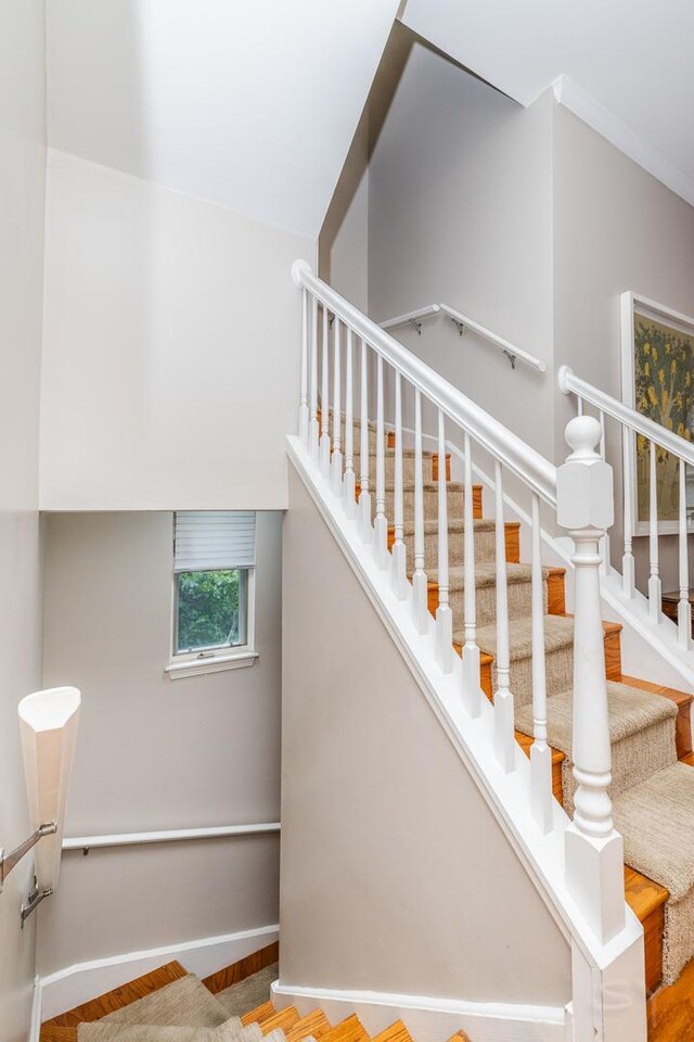 909 W Village Ct, Chicago, IL 60608 - stairway featuring baseboards