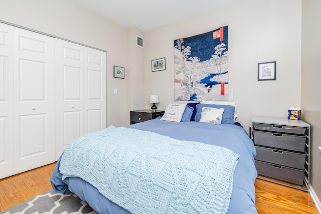 909 W Village Ct, Chicago, IL 60608 - bedroom with wood finished floors and a closet