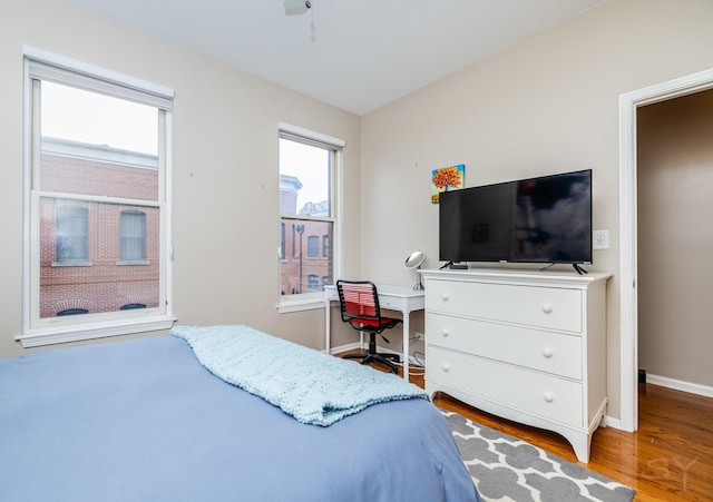 909 W Village Ct, Chicago, IL 60608 - bedroom with multiple windows and wood finished floors
