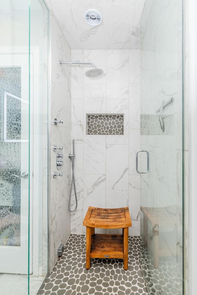 909 W Village Ct, Chicago, IL 60608 - bathroom featuring a marble finish shower