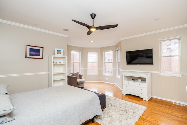 909 W Village Ct, Chicago, IL 60608 - bedroom featuring light wood-style floors, crown molding, and a ceiling fan