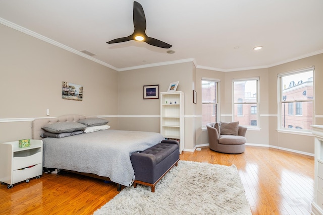 909 W Village Ct, Chicago, IL 60608 - bedroom with light wood-type flooring, ornamental molding, a ceiling fan, and recessed lighting