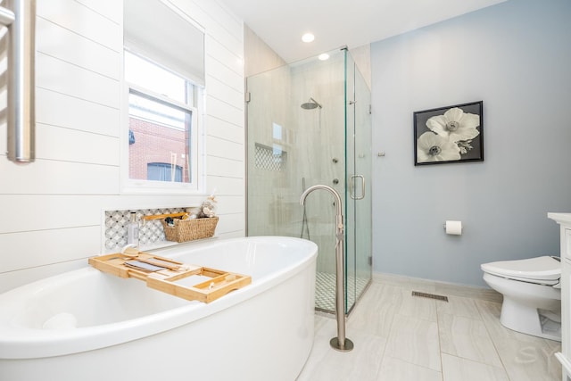 909 W Village Ct, Chicago, IL 60608 - full bath with a freestanding bath, a shower stall, recessed lighting, and vanity