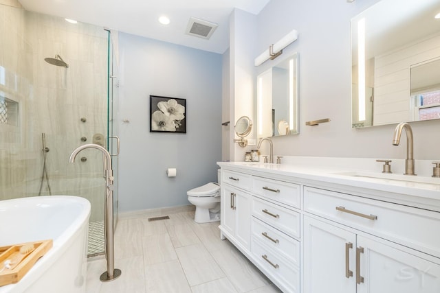 909 W Village Ct, Chicago, IL 60608 - bathroom with double vanity, a freestanding bath, a stall shower, and recessed lighting