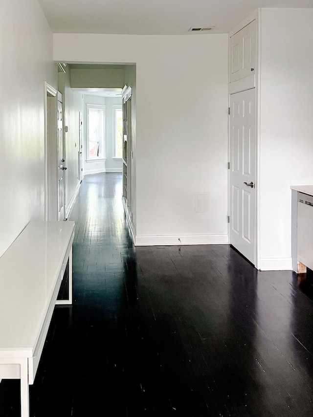 2641 W Thomas St, Chicago, IL 60622 - hallway with dark wood finished floors and baseboards