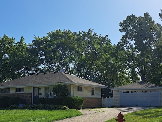 31 Johnathan Rd, Lake Zurich, IL 60047 - ranch-style house featuring brick siding, a detached garage, and a front yard
