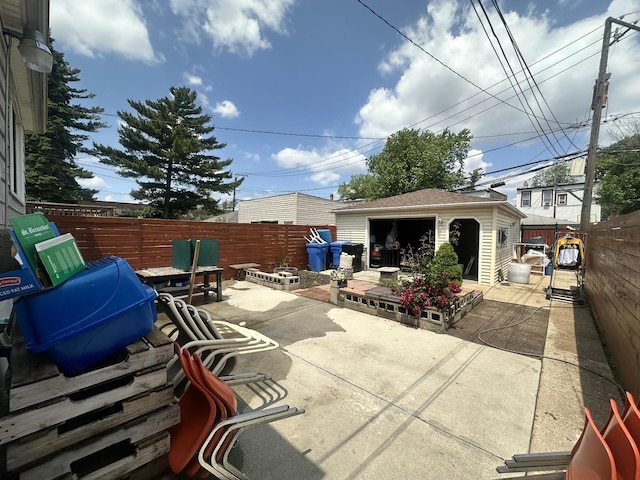 4440 W Iowa St, Chicago, IL 60651 - fenced backyard featuring a patio and an outdoor structure