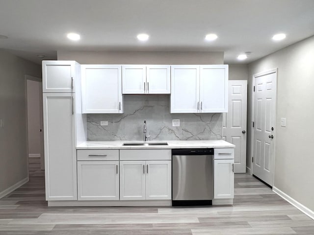 21655 Clyde Ave, Sauk Village, IL 60411 - kitchen with dishwasher, light wood-style floors, decorative backsplash, white cabinetry, and recessed lighting
