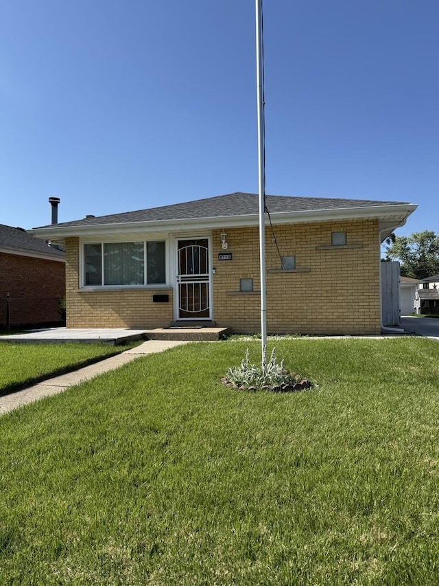 3712 W 121st St, Alsip, IL 60803 - ranch-style house with brick siding and a front yard