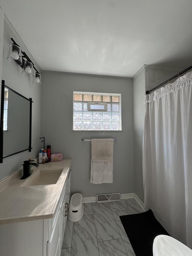 3712 W 121st St, Alsip, IL 60803 - full bath featuring vanity, marble look tiles, and a shower with shower curtain