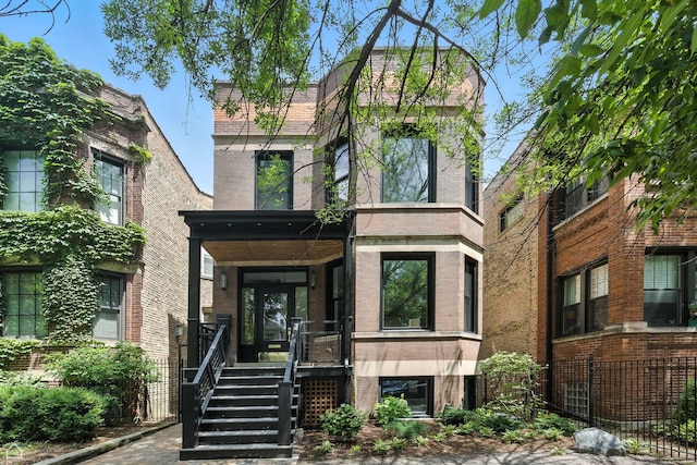 4525 N Artesian Ave, Chicago, IL 60625 - view of front of house with brick siding and a porch