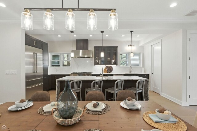 4525 N Artesian Ave, Chicago, IL 60625 - dining room featuring ornamental molding, recessed lighting, and light wood-style flooring