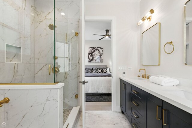 4525 N Artesian Ave, Chicago, IL 60625 - bathroom with a marble finish shower, connected bathroom, double vanity, marble look tile flooring, and a ceiling fan
