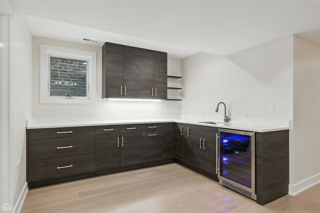4525 N Artesian Ave, Chicago, IL 60625 - indoor wet bar featuring wine cooler and light wood-style flooring
