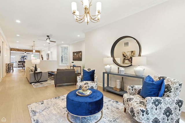 4525 N Artesian Ave, Chicago, IL 60625 - living room featuring wood finished floors, recessed lighting, crown molding, a chandelier, and ceiling fan
