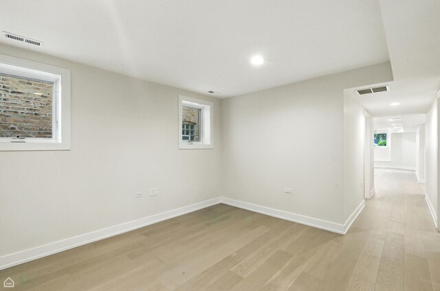4525 N Artesian Ave, Chicago, IL 60625 - unfurnished room with light wood-style floors and recessed lighting