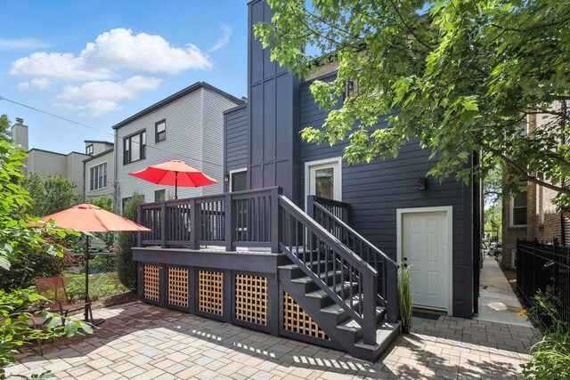 4525 N Artesian Ave, Chicago, IL 60625 - back of property with a deck and a patio area